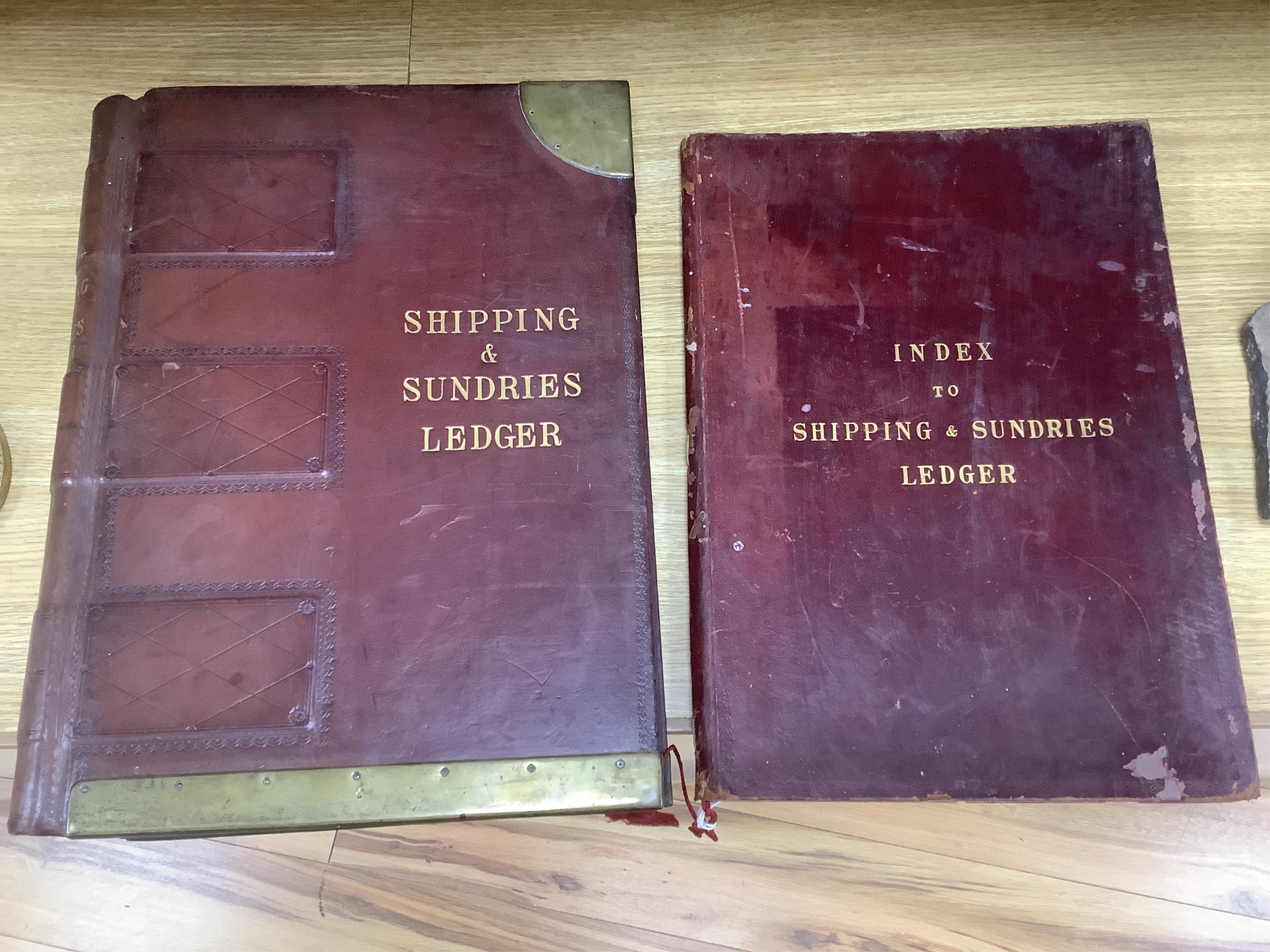A large brown leather and brass mounted Shipping and Sundries Ledger together with similar smaller Index to Shipping and Sundries ledger, both unused. Largest 49cm high x 36cm wide